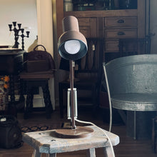 Load image into Gallery viewer, Vintage-style lamp on a wooden stool in a room with furniture and decor.