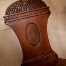 Load image into Gallery viewer, Close-up of a wooden pedestal with intricate carvings against a beige background
