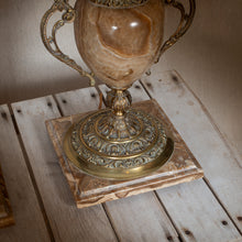 Load image into Gallery viewer, Decorative marble lamp with gold handles on a wooden table.
