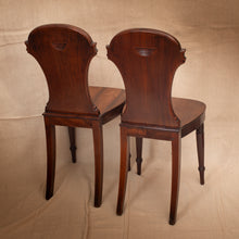 Load image into Gallery viewer, Two wooden chairs on a beige fabric background

